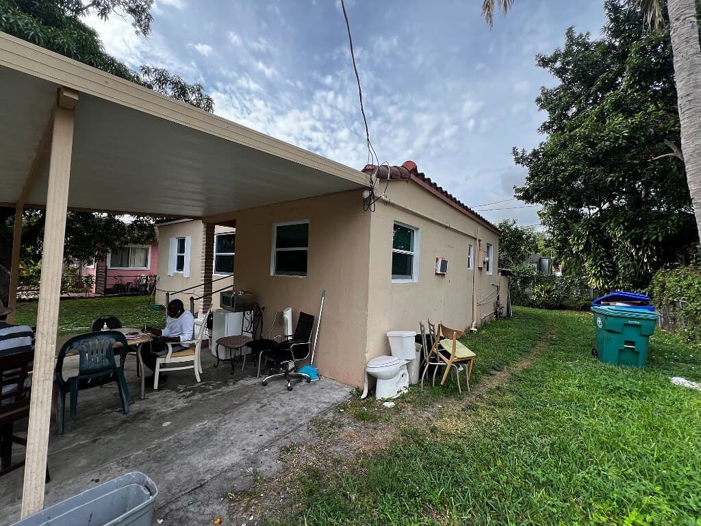 Little Haiti, FL home before as-is cash sale