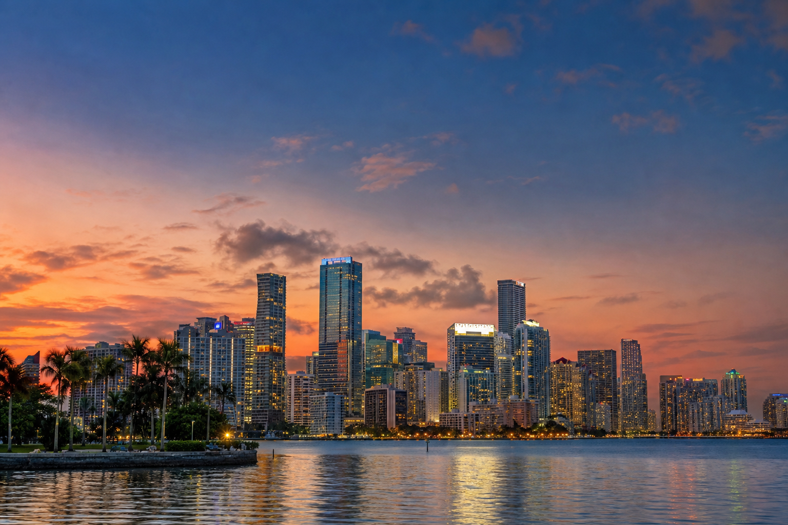 Downtown Miami skyline across Biscayne Bay at dusk